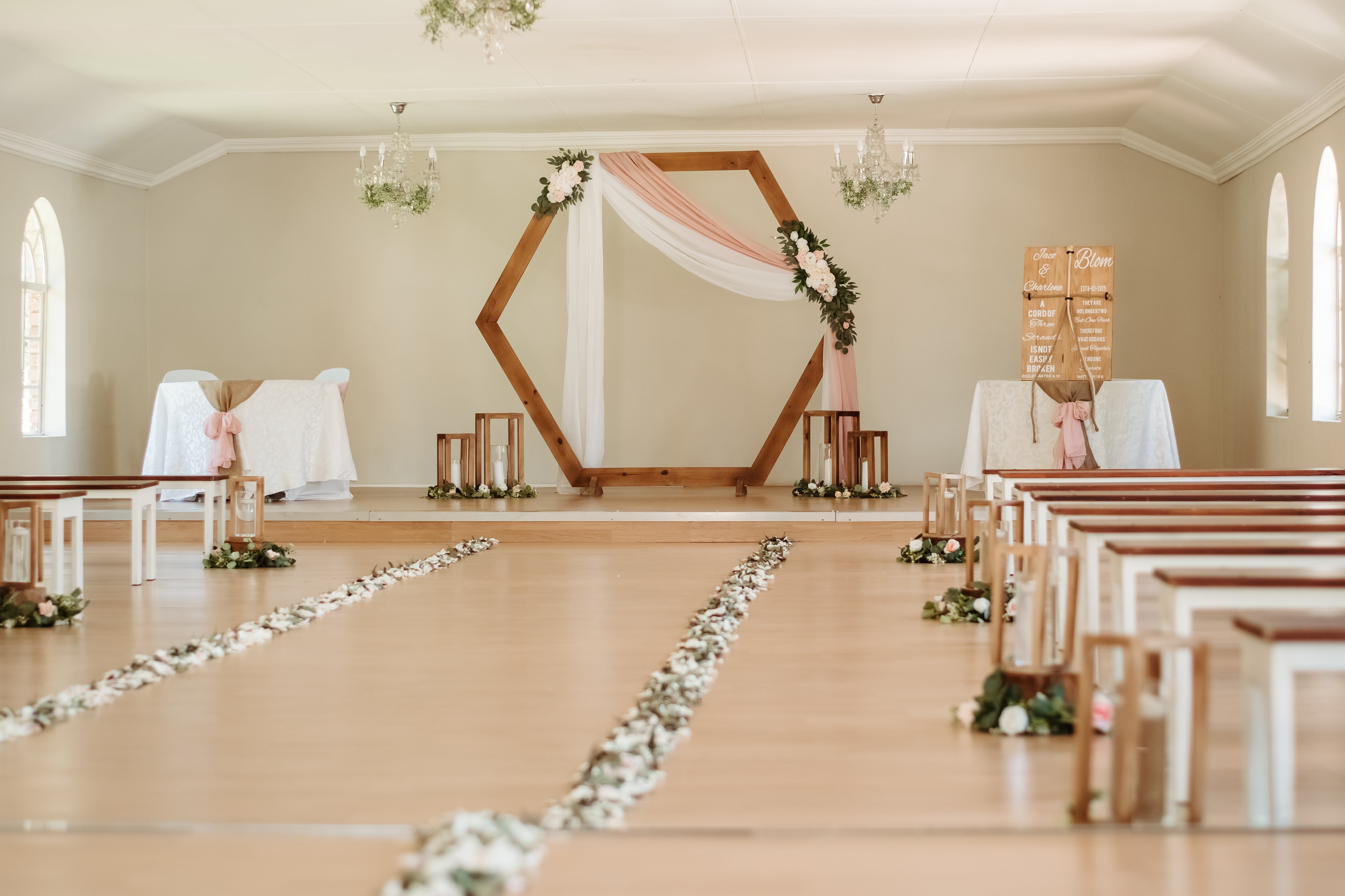 wooden lantern centerpiece with candle on wood log base